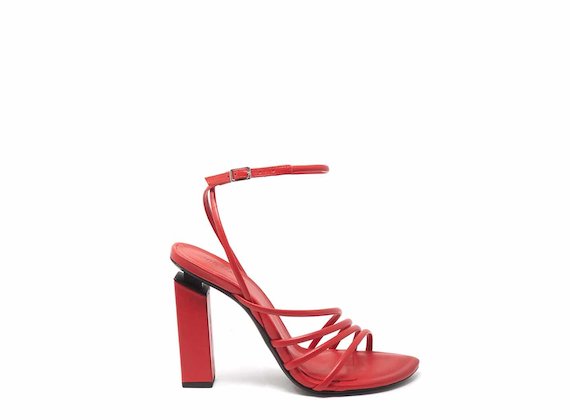 Red high-heeled sandals with strips and ankle strap