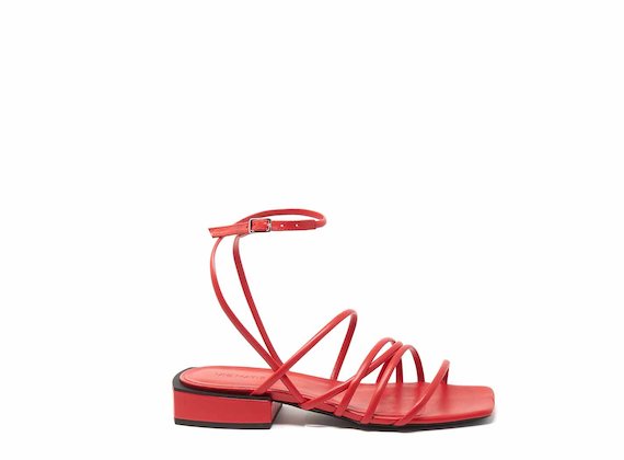 Flat red sandals with strips and ankle strap - Red