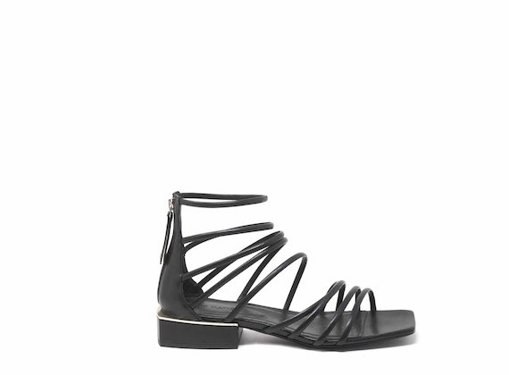 Black sandals with criss-cross strips