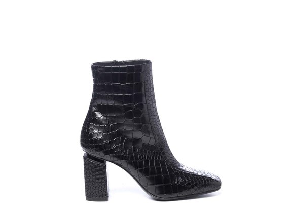 Black crocodile-print leather ankle boots with suspended heels