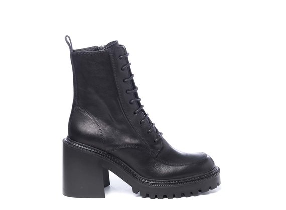 Lugged-sole combat boots in black calfskin - Black
